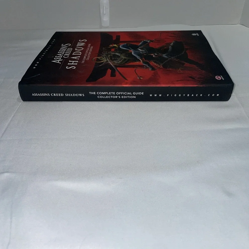Assassins Creed Shadows Official Guide Collectors Edition Piggyback Hardcover